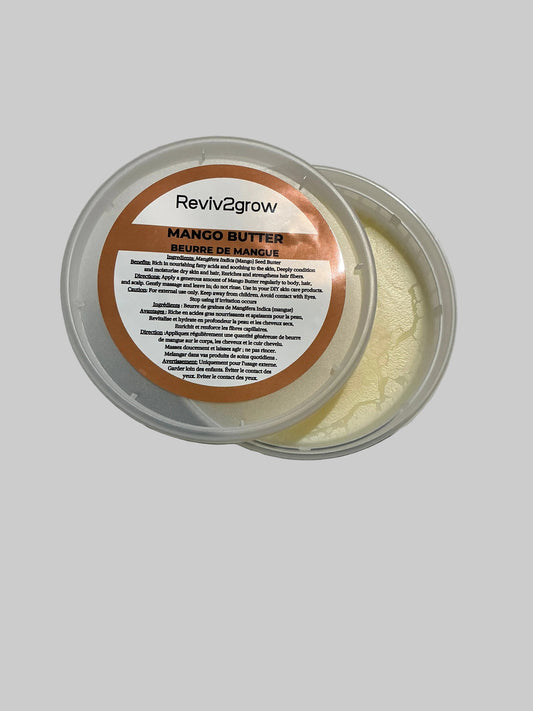 Container of Reviv2grow mango butter on a marble surface