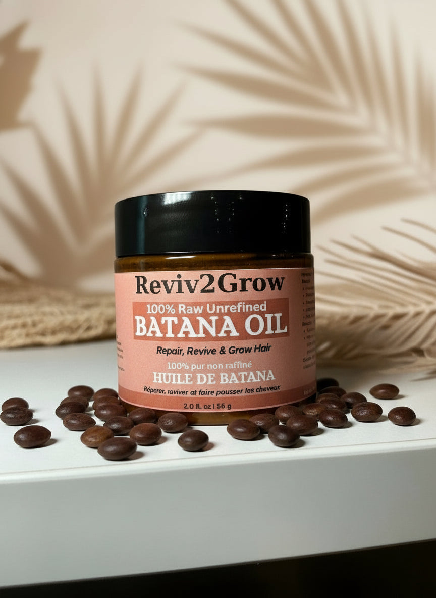 Jar of Reviv2Grow Batana Oil on a white surface