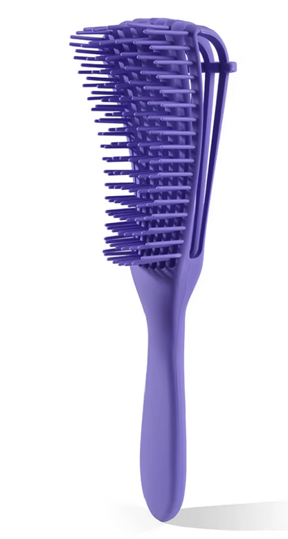 Purple hairbrush on a white background