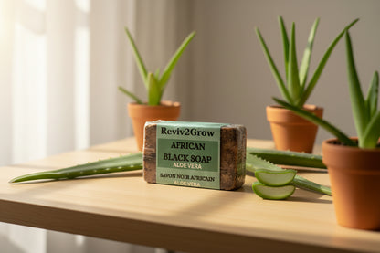 Bar of African Black Soap with Aloe Vera on a white marble surface