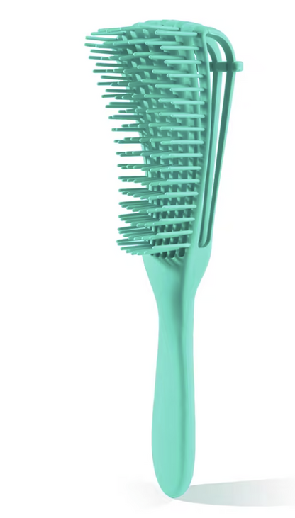 Turquoise hairbrush on a white background