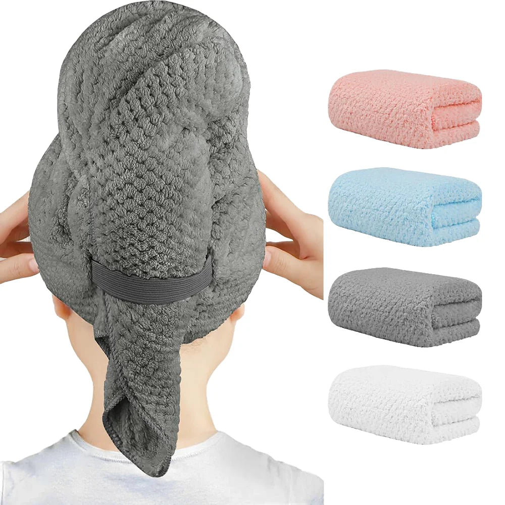 Gray towel on head with additional towels in various colors displayed below.