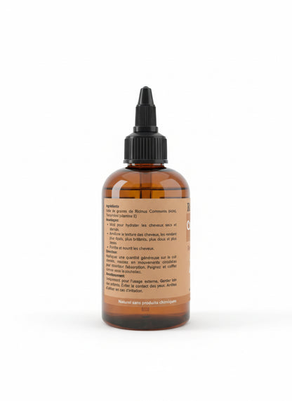 Brown glass bottle with black cap on a white background